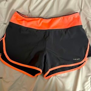 Hind athletic shorts. Grey with pink lining.